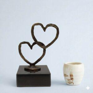 Liefdessculptuur "Twee Hartjes, Eén Liefde" - Design Ger van Tankeren - Verbronsd