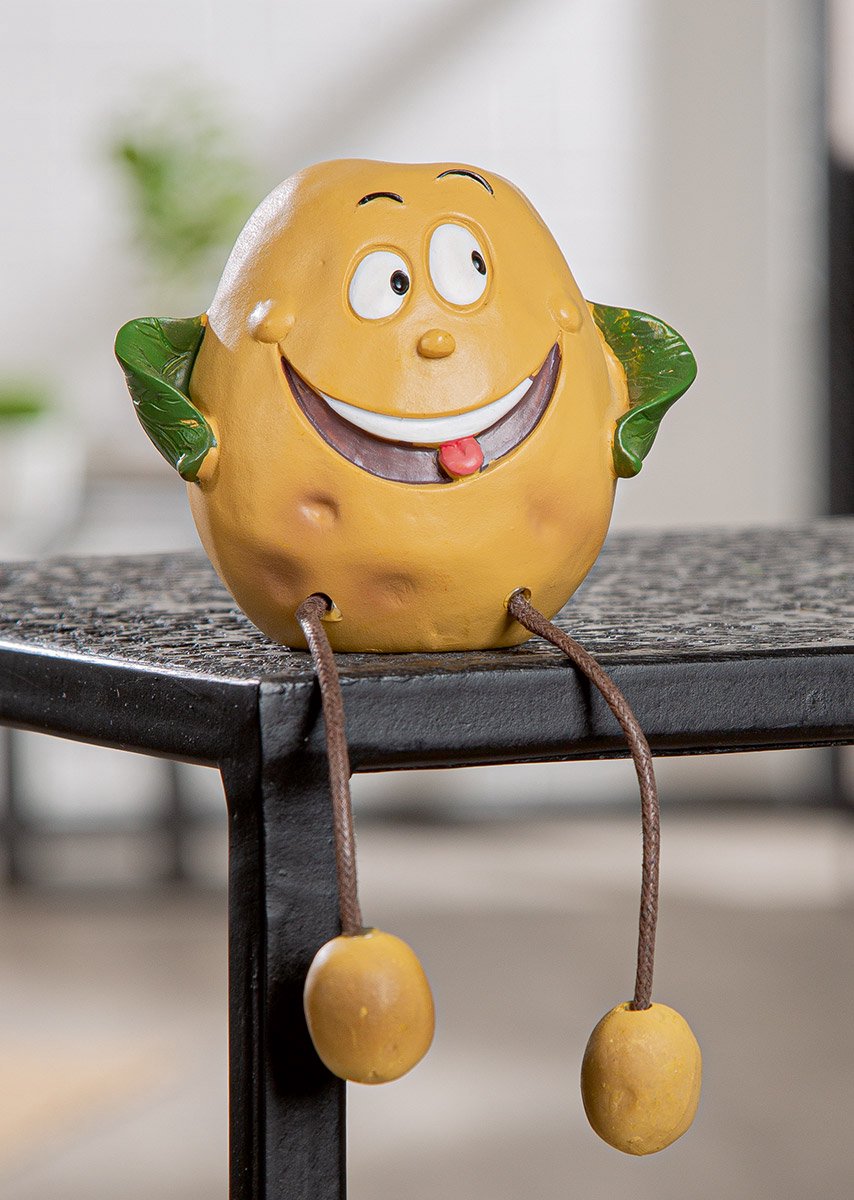 Aardappel gezicht poppetje beeld rand zittend